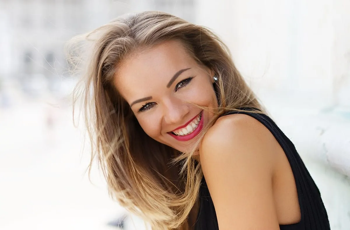 Young woman showing off her beautiful smile